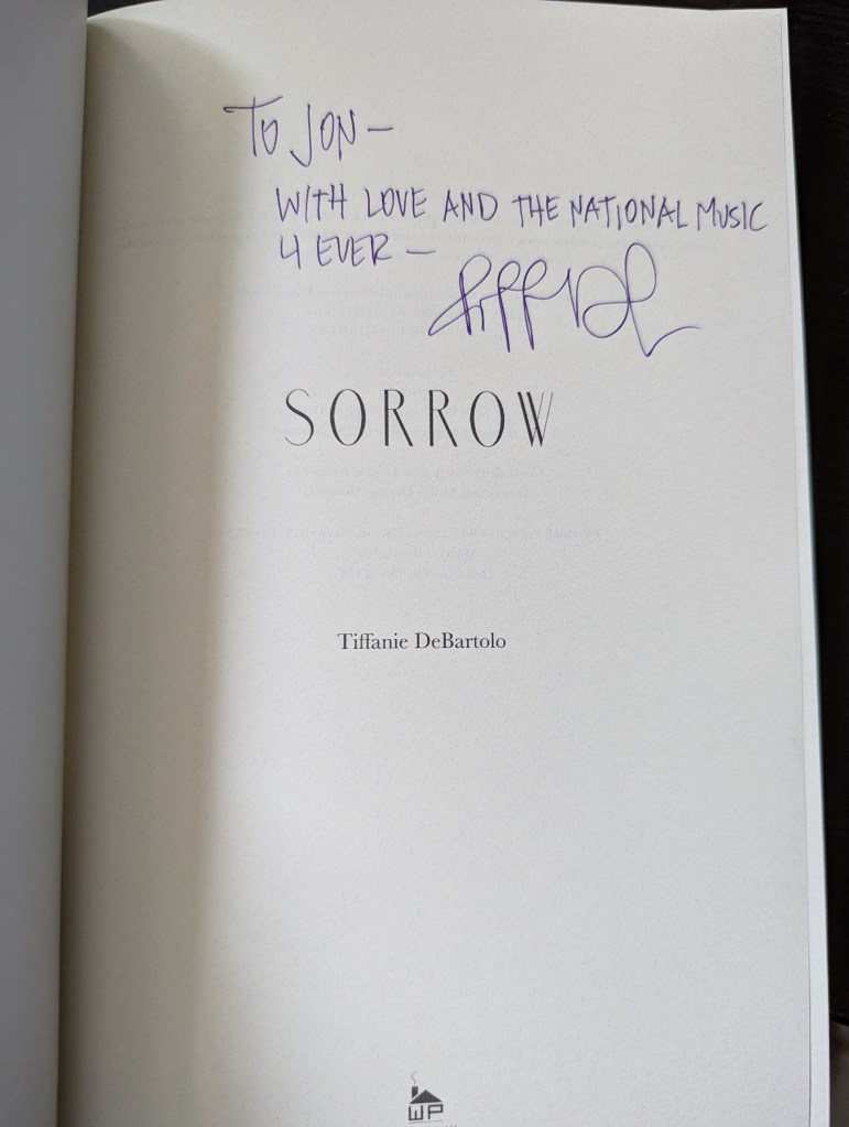 An inscription on the title page of the novel Sorrow,: To Jon - with love and the National music 4 ever -
(signed by author Tiffanie DeBartolo)